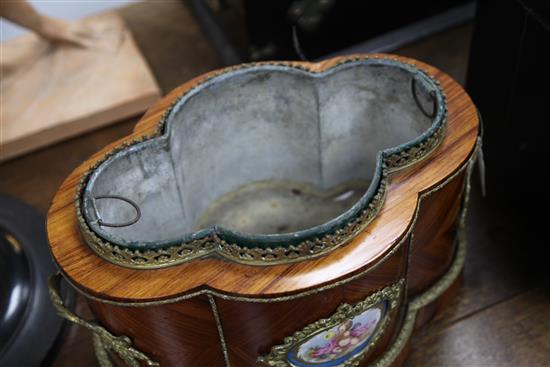 A 19th century French serpentine shape kingwood two handled jardiniere, 14.5in.